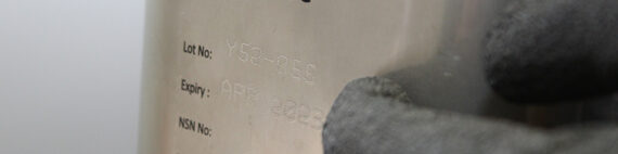 Alt text: Instructions written on the side of an oxygen candle.